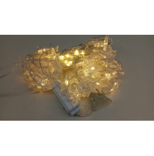 PISCA CORTINA 140 LEDS AMARELO 2.5X1M 8F.70 ESTRELAS BIVOLT